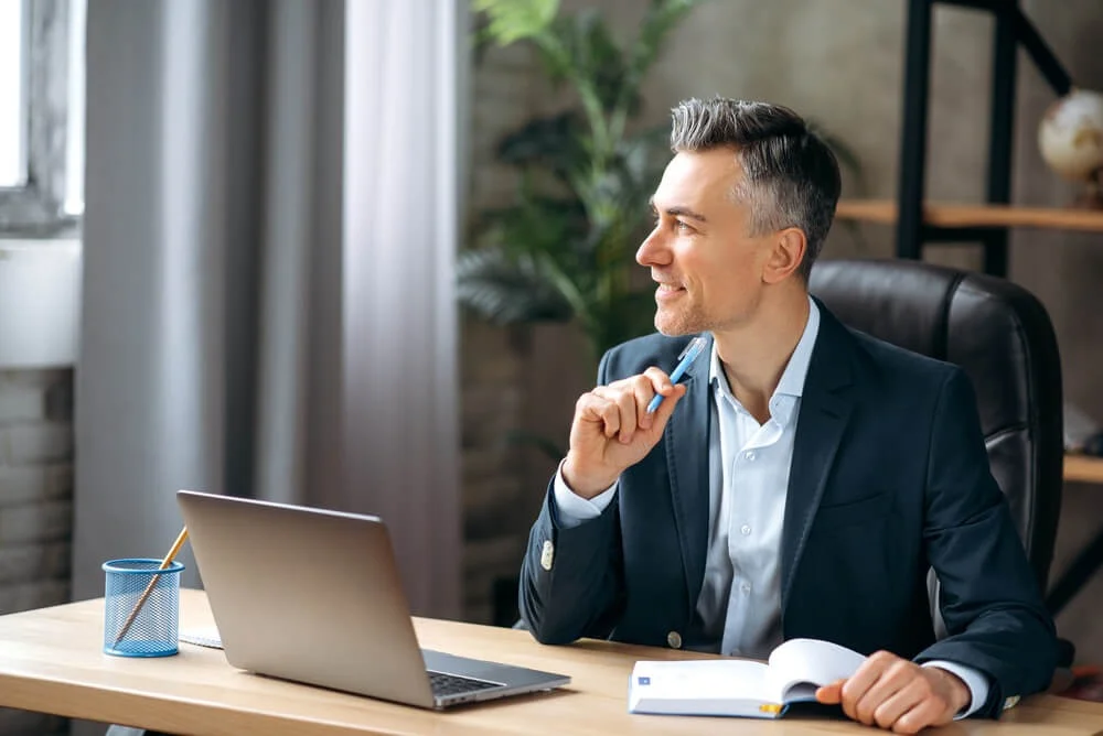man laptop pen